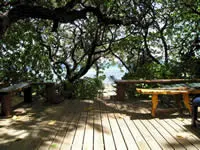 Beach front bure outdoor deck at Beachcomber Island Resort
