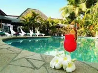 Cocktail by the Pool at Capricorn International Hotel
