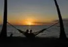 Couple on hammock at sunset