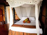 Deluxe seaside bure interior at Crusoe's Retreat