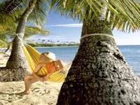 Relaxing in hammock - Lomani Island Resort