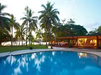 Restaurant at sunset - Lomani Island Resort