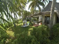 Beach-front bures at Outrigger Fiji Beach Resort